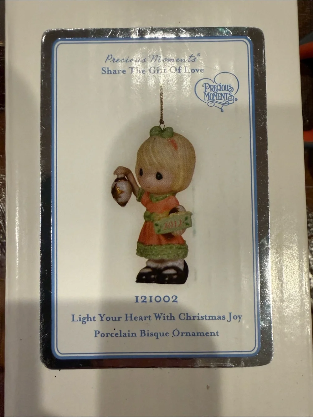 Precious Moments light your heart with Christmas joy, girl with ornament 121002